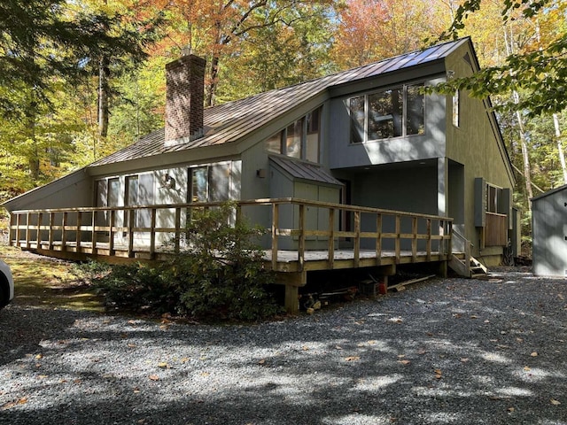 rear view of house with a deck