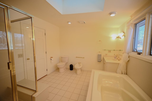 bathroom with tile patterned floors, vanity, a bidet, toilet, and a shower with shower door