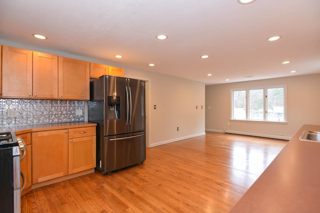 kitchen with stainless steel refrigerator with ice dispenser, light wood-type flooring, a baseboard radiator, and white electric stove