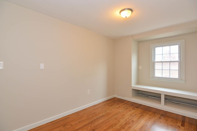 empty room featuring light hardwood / wood-style flooring