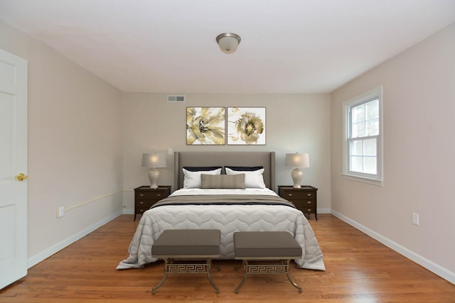 bedroom with light hardwood / wood-style flooring