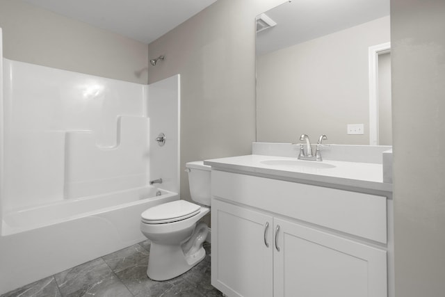 full bathroom featuring bathtub / shower combination, vanity, and toilet