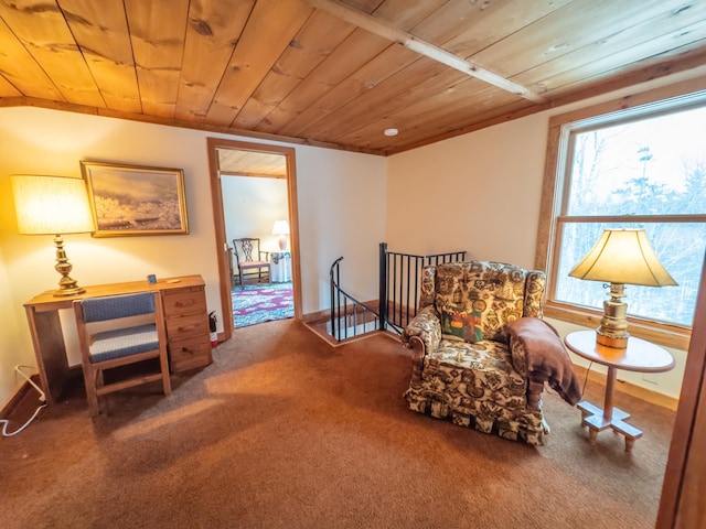 living area featuring carpet and wooden ceiling