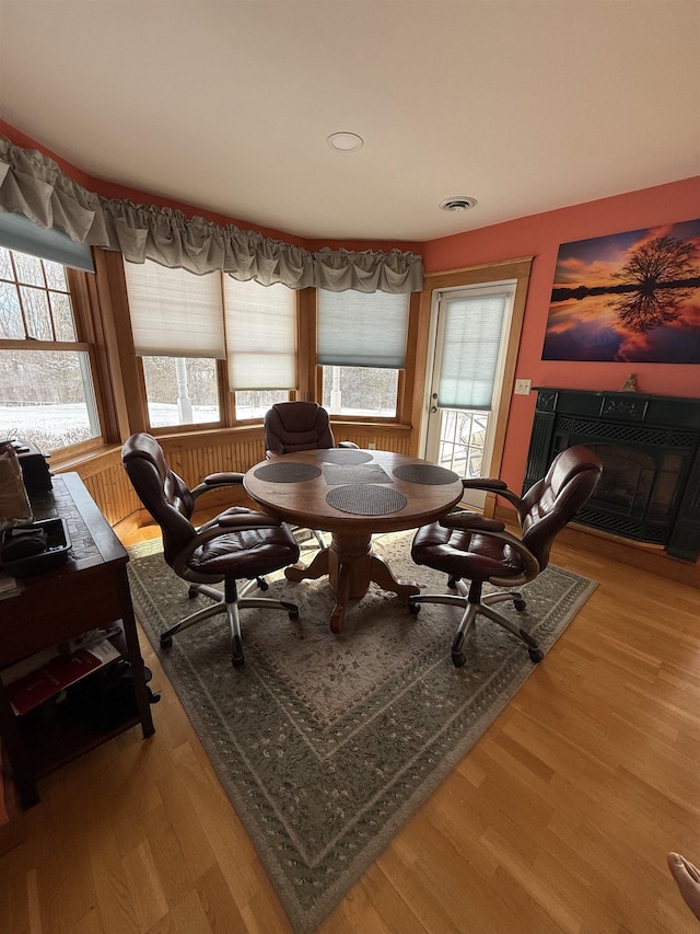 dining room with hardwood / wood-style flooring