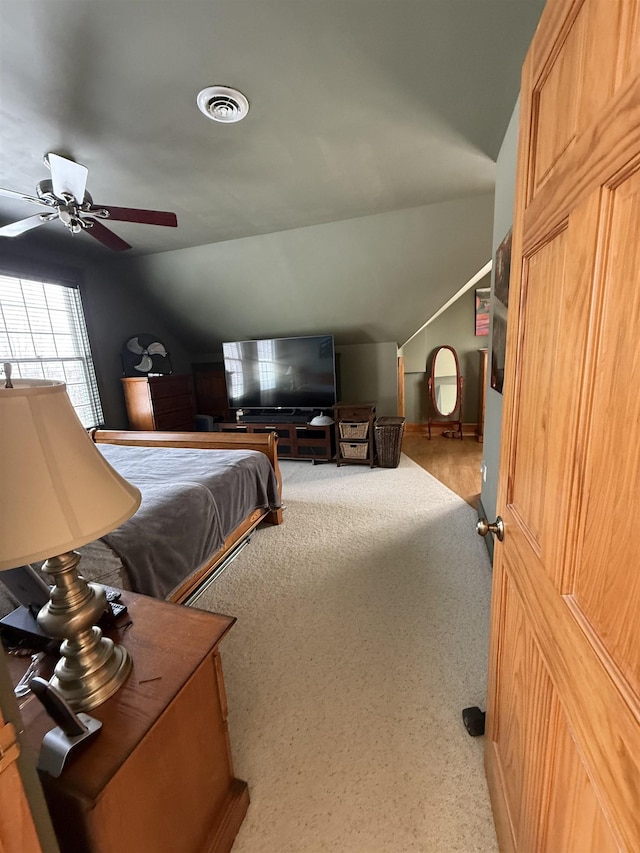 bedroom featuring ceiling fan and carpet floors