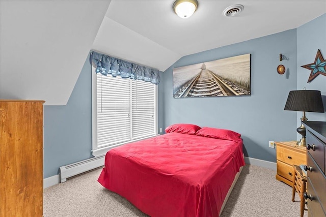 bedroom with baseboard heating, lofted ceiling, and light carpet