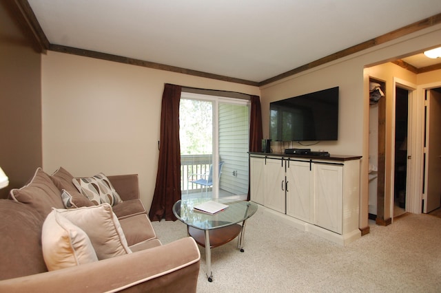 living room with light carpet and ornamental molding