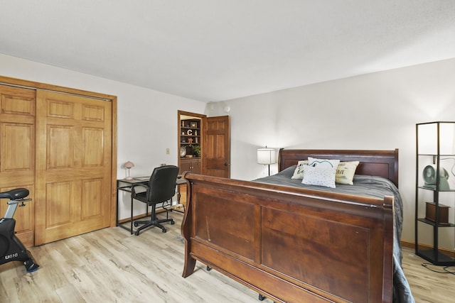 bedroom featuring light wood-type flooring