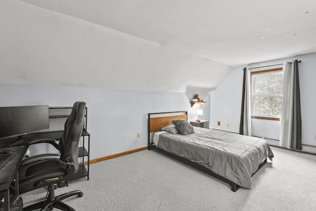 carpeted bedroom featuring lofted ceiling