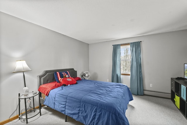 bedroom with light colored carpet and a baseboard radiator