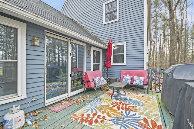 wooden terrace featuring area for grilling