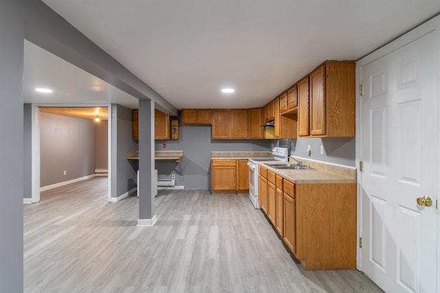 kitchen with baseboard heating, white range with electric cooktop, sink, and light hardwood / wood-style floors