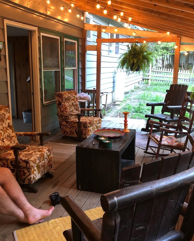 exterior space featuring outdoor lounge area, a pergola, and a deck