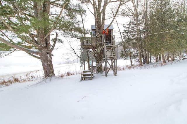 view of yard covered in snow