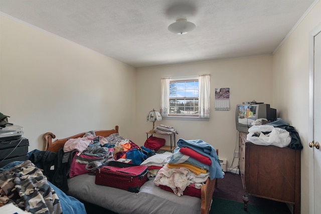 bedroom featuring carpet and ornamental molding