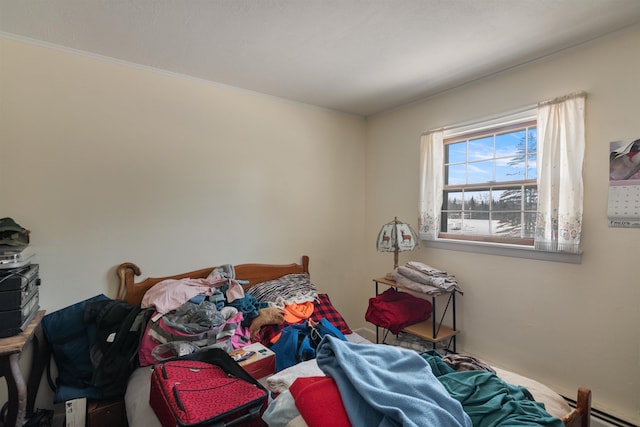 bedroom with crown molding