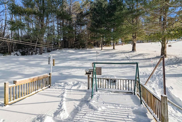 view of snow covered deck