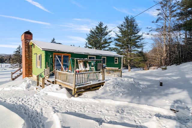 view of snow covered property