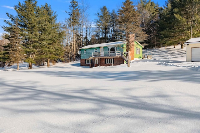 view of front of home with a wooden deck