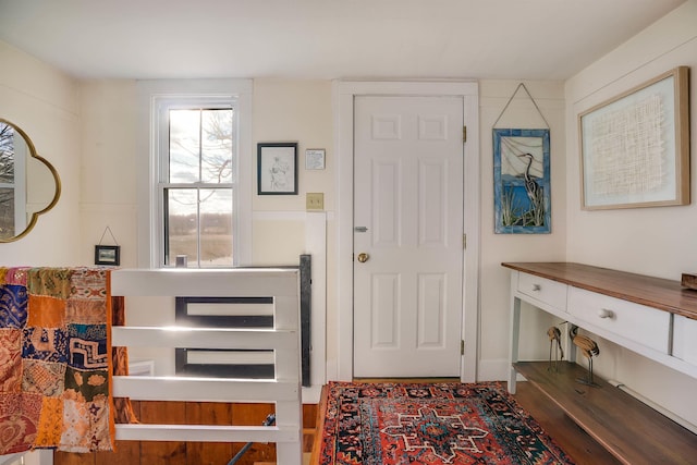 foyer with hardwood / wood-style flooring