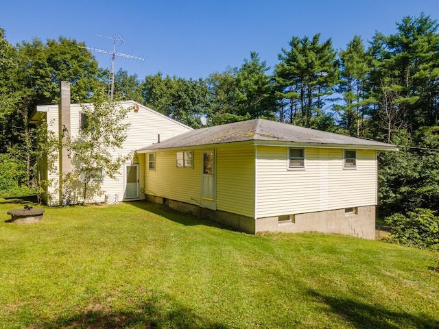 view of property exterior featuring a yard