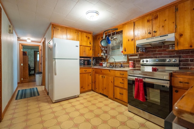 kitchen featuring appliances with stainless steel finishes and sink