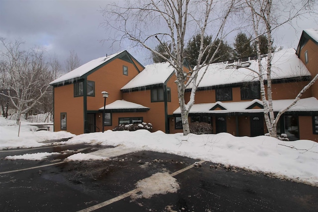 view of snow covered property