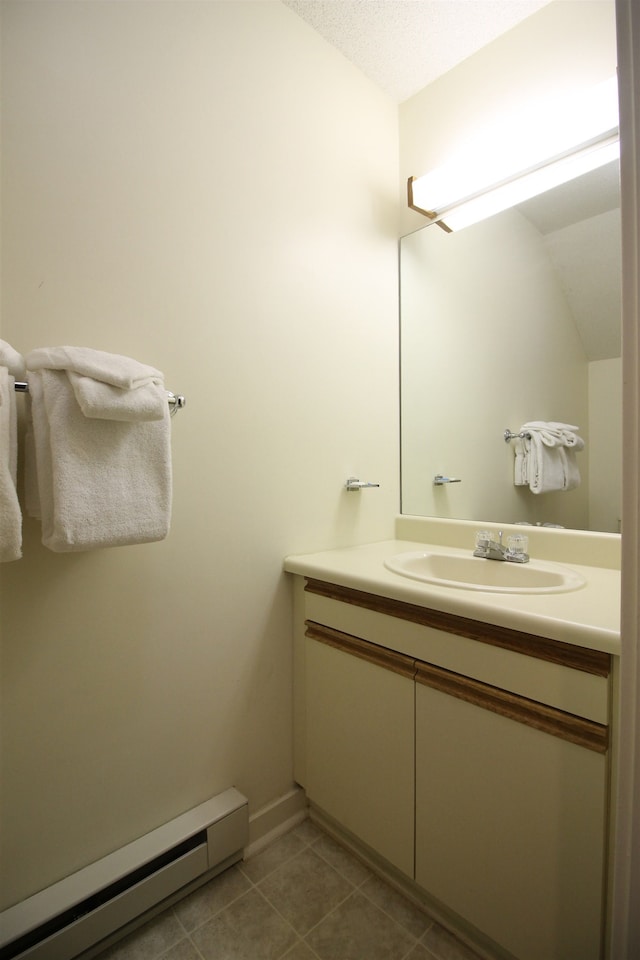 bathroom featuring vanity and a baseboard heating unit