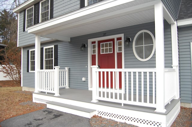 property entrance featuring covered porch