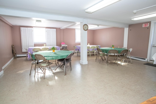 dining area with a baseboard heating unit