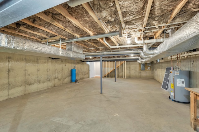 basement featuring water heater