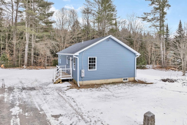 view of snow covered property