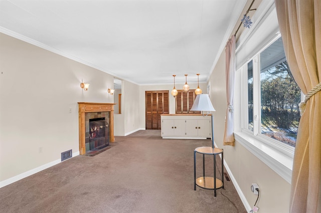 carpeted living room featuring a fireplace and ornamental molding