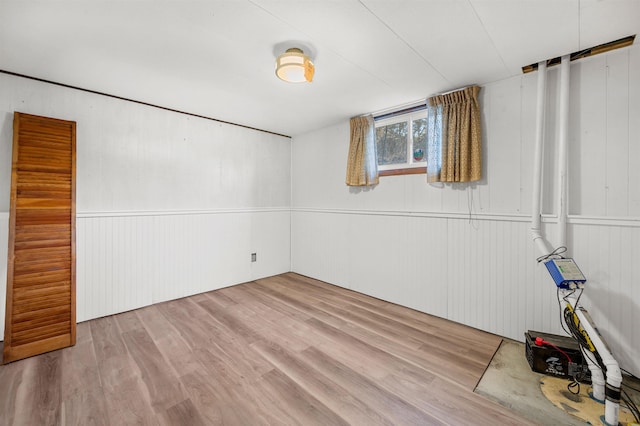 spare room featuring light hardwood / wood-style floors