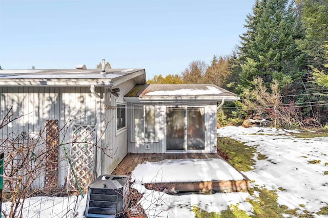 view of snow covered property