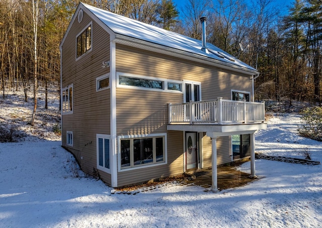 exterior space featuring a wooden deck