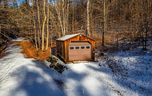 view of snow covered garage