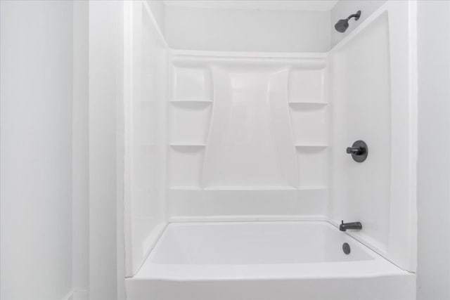 bathroom with shower / tub combination