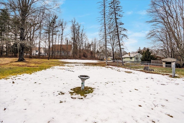 view of yard covered in snow