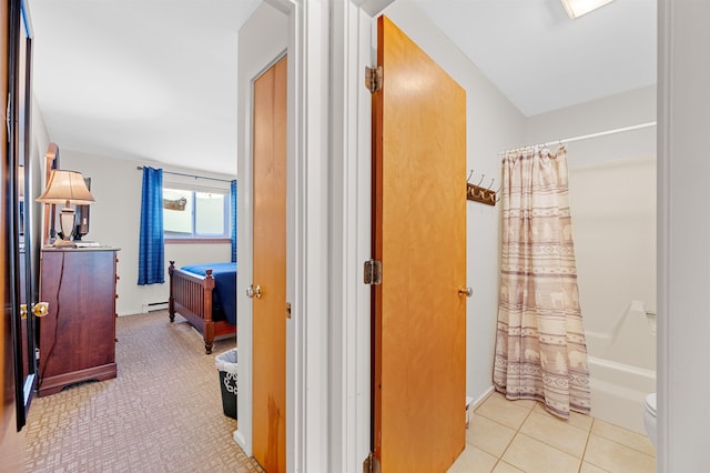 bathroom with tile patterned floors, shower / bath combo, toilet, and a baseboard heating unit