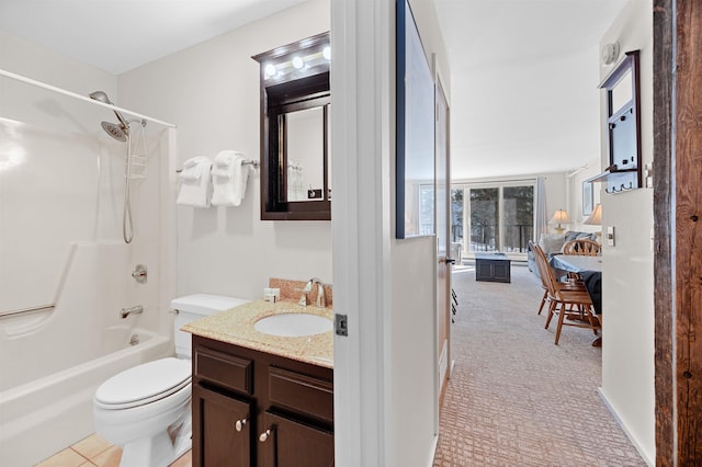 full bathroom with shower / washtub combination, vanity, and toilet