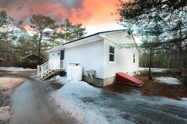 view of snow covered property