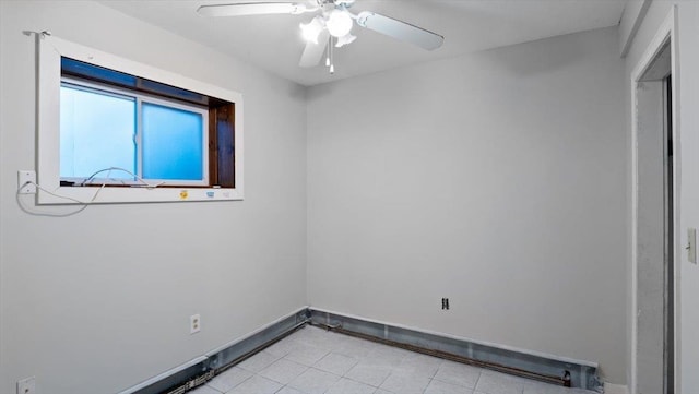 spare room featuring ceiling fan