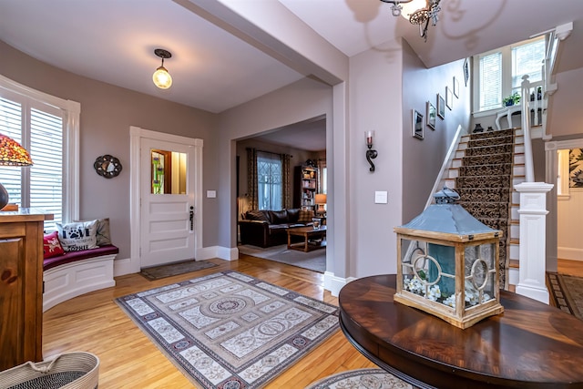 foyer entrance with light hardwood / wood-style flooring