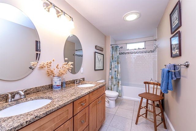 full bathroom with tile patterned flooring, vanity, toilet, and shower / bath combo with shower curtain