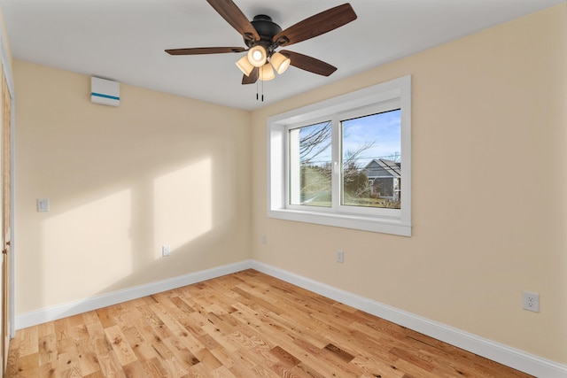 spare room with ceiling fan and light hardwood / wood-style floors