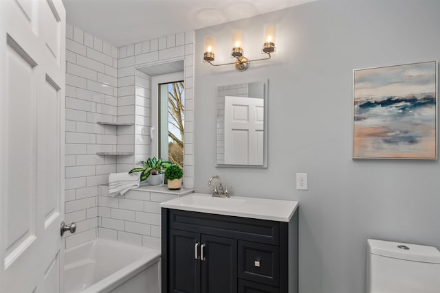 bathroom featuring vanity and toilet