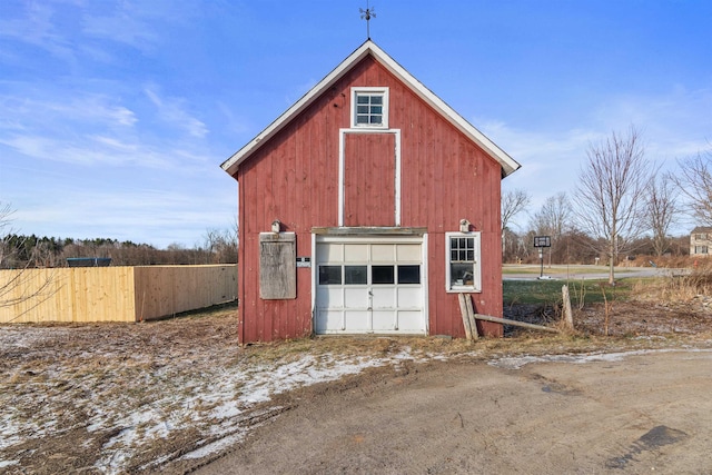 view of outbuilding featuring a garage