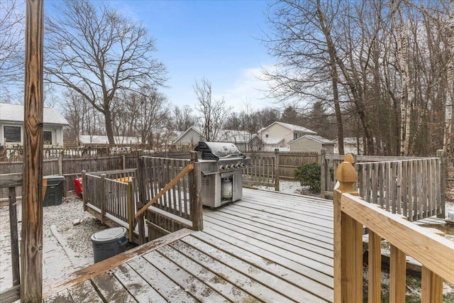 view of snow covered deck