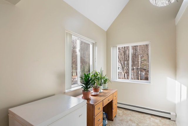 office area featuring a baseboard radiator and lofted ceiling